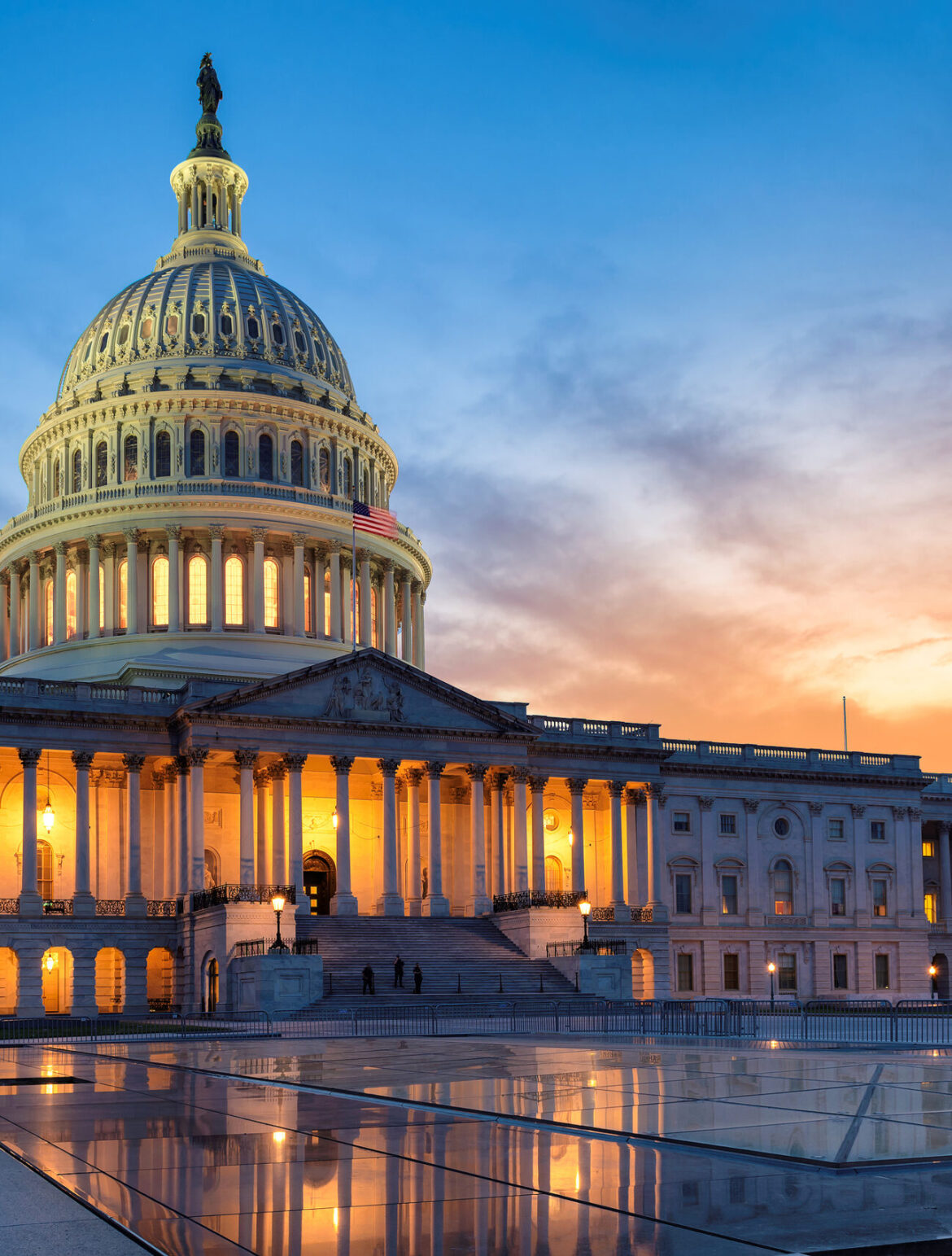 The United States Capitol building at sunset, Washington DC, USA.